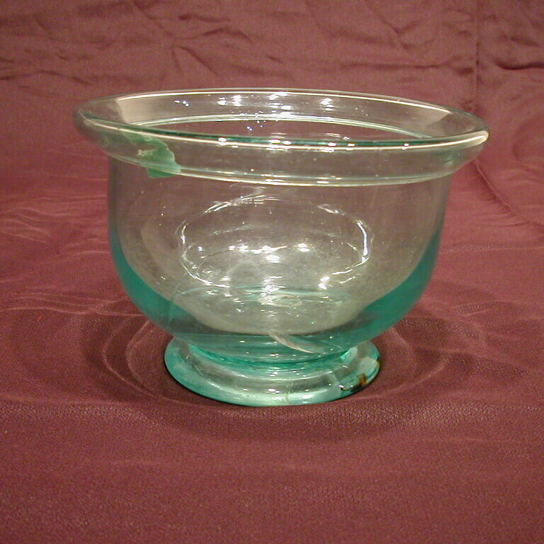 glass bowl on red cloth background