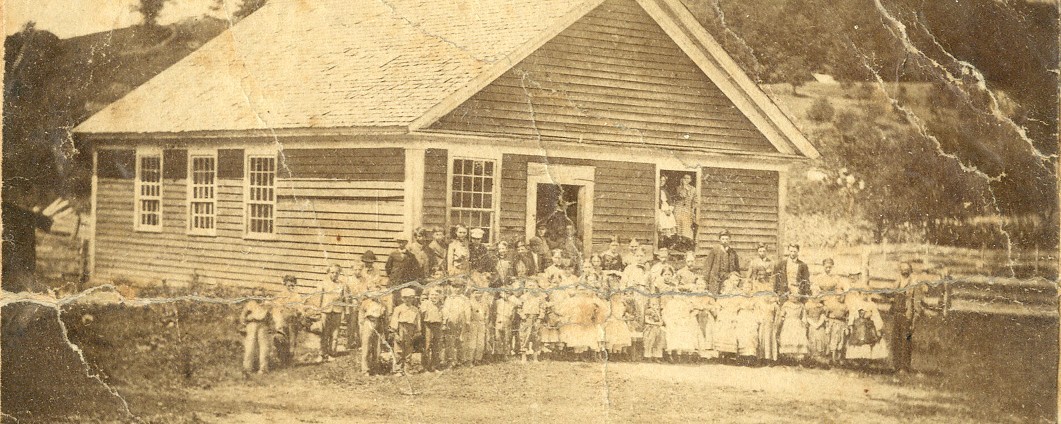 group of children standing outside school