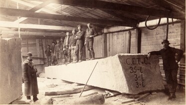 granite workers in shed