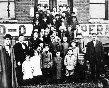 Children of Lawrence, MA, Bread and Roses Strike on the steps of the Old Labor Hall in Barre, VT